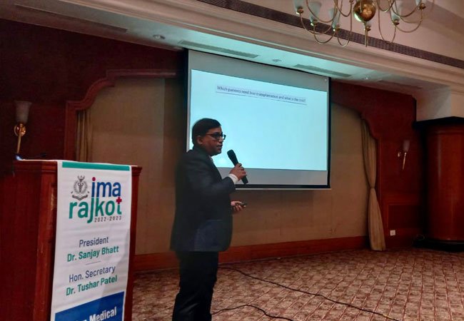 Healthcare professional discussing liver treatment methods