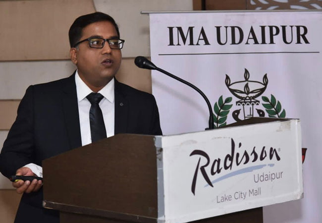 Medical expert delivering speech on liver health